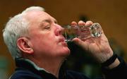 29 March 2005; Coach Alan Gaffney takes a drink during a Munster rugby press conference. Castletroy Park Hotel, Limerick. Picture credit; Kieran Clancy / SPORTSFILE