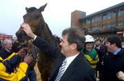 29 March 2005;Winning owner J.P McManus congratulates Like A Butterfly after winning the Powers Gold Cup. Fairyhouse Racecourse, Co. Meath. Picture credit; Damien Eagers / SPORTSFILE