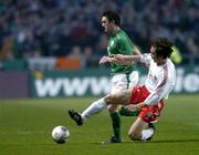 29 March 2005; Robbie Keane, Republic of Ireland, in action against Yonghai  Zhang, China. International Friendly, Republic of Ireland v China, Lansdowne Road, Dublin Picture credit; Pat Murphy / SPORTSFILE