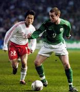 29 March 2005; Stephen Elliott, Republic of Ireland, in action against Zhaniun Hu, China. International Friendly, Republic of Ireland v China, Lansdowne Road, Dublin Picture credit; David Maher / SPORTSFILE