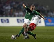 29 March 2005; Graham Kavanagh, Republic of Ireland, in action against Jiayi Shao, China. International Friendly, Republic of Ireland v China, Lansdowne Road, Dublin Picture credit; Pat Murphy / SPORTSFILE