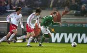 29 March 2005; Stephen Elliott, Republic of Ireland, in action against Win Wei, left and Weifeng Li, China. International Friendly, Republic of Ireland v China, Lansdowne Road, Dublin Picture credit; Pat Murphy / SPORTSFILE