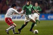 29 March 2005; Liam Miller, Republic of Ireland, in action against Weifeng Li, China. International Friendly, Republic of Ireland v China, Lansdowne Road, Dublin Picture credit; Pat Murphy / SPORTSFILE