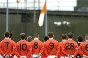 27 March 2005; The Armagh players face their county flag for the national anthem before the game. Allianz National Football League, Division 1B, Armagh v Kildare, St. Oliver Plunkett Park, Crossmaglen, Co. Armagh. Picture credit; Brendan Moran / SPORTSFILE
