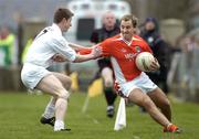 27 March 2005; Patrick McKeever, Armagh, in action against Karl Ennis, Kildare. Allianz National Football League, Division 1B, Armagh v Kildare, St. Oliver Plunkett Park, Crossmaglen, Co. Armagh.. Picture credit; Brendan Moran / SPORTSFILE