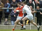 27 March 2005; Andrew McCann, Armagh, in action against Karl Ennis, Kildare. Allianz National Football League, Division 1B, Armagh v Kildare, St. Oliver Plunkett Park, Crossmaglen, Co. Armagh. Picture credit; Brendan Moran / SPORTSFILE
