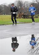 1 January 2014; Austin O'Sullivan, left, and Geraldine Nolan competing in the 2014 Tom Brennan Memorial Trophy 5K Road Race. Phoenix Park, Dublin. Picture credit: Ramsey Cardy / SPORTSFILE