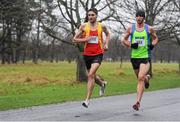 1 January 2014; Thomas Fitzpatrick, Tallaght A.C., Dublin, left, alongside eventual winner John Coghlan, MSB A.C., Co. Dublin, during the early stages of the 2014 Tom Brennan Memorial Trophy 5K Road Race. Phoenix Park, Dublin. Picture credit: Ramsey Cardy / SPORTSFILE