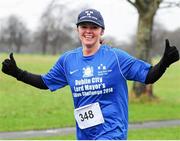 1 January 2014; Sharon Woods, from Dublin, in jovial mood during the 2014 Tom Brennan Memorial Trophy 5K Road Race. Phoenix Park, Dublin. Picture credit: Tomás Greally / SPORTSFILE