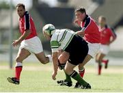 14 August 1999; Ronan O'Gara, Munster, supported by team-mate Mike Mullins kicks for touch despite the blockdown attempt by Bernard Jackman, Connacht. Interprovincial Rugby Championship, Connacht v Munster, The Sportsground, Galway. Picture credit: Brendan Moran / SPORTSFILE