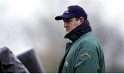 9 December 1999; Munster's Peter Clohessy covers up from the rain while sitting out training. Munster Rugby Squad Training, TOEC TOAL Sports Complex, Toulouse, France. Picture credit: Brendan Moran / SPORTSFILE