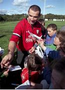 5 October 1999; Ireland's Conor O'Shea signs autographs after Ireland Rugby training. Ireland Rugby Squad Training, Clonakilty RFC, Co. Cork. Picture credit: Matt Browne / SPORTSFILE