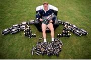 6 October 1999; Australia's Tim Horan sits in an inflatable chair at a squad training session in Portmarnock after he broke the Guinness try challenge during their game against Romania. Tim scored Australia's first try in under 119.5 seconds, the time it takes to pour the perfect pint of Guinness. As a result, Tim received a year's supply of Guinness and there was a £10,000 donation to the charity of Tim's choice. Australia Rugby Squad Training, Portmarnock Hotel and Golf Links, Dublin. Picture credit: Brendan Moran / SPORTSFILE