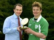 31 March 2005; Ireland's leading rugby and sports media have voted for Irish Captain, Brian O'Driscoll, as the Sure For Men RBS Six Nations Player Of The Tournament, 2005. He was presented with the his trophy by Conor Kavanagh, Group Product Manager, Lever Faberge, as he took time out from training with Leinster for the team's crucial Heineken Cup quarter final clash with Leicester this Saturday. Sure For Men is official deodorant to the Irish rugby team. Old Belvedere, Anglesea Road, Dublin. Picture credit; Brendan Moran / SPORTSFILE