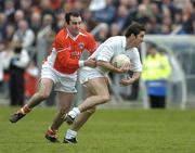 27 March 2005; Anthony Rainbow, Kildare, in action against Martin O'Rourke, Armagh. Allianz National Football League, Division 1B, Armagh v Kildare, St. Oliver Plunkett Park, Crossmaglen, Co. Armagh.. Picture credit; Brendan Moran / SPORTSFILE