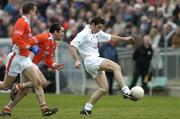 27 March 2005; Anthony Rainbow, Kildare, in action against Martin O'Rourke and Paul McGrane, left, Armagh. Allianz National Football League, Division 1B, Armagh v Kildare, St. Oliver Plunkett Park, Crossmaglen, Co. Armagh. Picture credit; Brendan Moran / SPORTSFILE