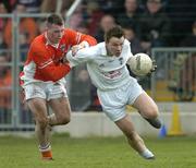 27 March 2005; Derek McCormack, Kildare, in action against Ciaran McKeever, Armagh. Allianz National Football League, Division 1B, Armagh v Kildare, St. Oliver Plunkett Park, Crossmaglen, Co. Armagh. Picture credit; Brendan Moran / SPORTSFILE
