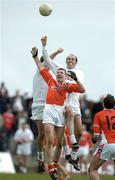 27 March 2005; John Toal, Armagh, contests a high ball with Killian Brennan, right, and Mick Wright, Kildare. Allianz National Football League, Division 1B, Armagh v Kildare, St. Oliver Plunkett Park, Crossmaglen, Co. Armagh. Picture credit; Brendan Moran / SPORTSFILE