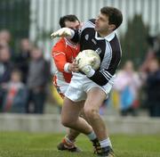 27 March 2005; Enda Murphy, Kildare, in action against Martin O'Rourke, Armagh. Allianz National Football League, Division 1B, Armagh v Kildare, St. Oliver Plunkett Park, Crossmaglen, Co. Armagh. Picture credit; Brendan Moran / SPORTSFILE