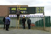 27 March 2005; The scoreboard attendant puts up the names of the teams before the start of the game. The score on the right is the final score of the preceding U-17 international rules game between Ireland and Australia. Allianz National Football League, Division 1B, Armagh v Kildare, St. Oliver Plunkett Park, Crossmaglen, Co. Armagh. Picture credit; Brendan Moran / SPORTSFILE