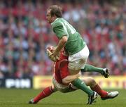 19 March 2005; Denis Hickie, Ireland, is tackled by Tom Shanklin, Wales. RBS Six Nations Championship 2005, Wales v Ireland, Millennium Stadium, Cardiff, Wales. Picture credit; Brendan Moran / SPORTSFILE