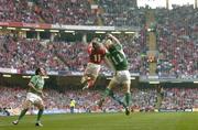 19 March 2005; Denis Hickie (11), Ireland, and Shane Williams (11), Wales, contest a high ball watched by Girvan Dempsey, left, Ireland. RBS Six Nations Championship 2005, Wales v Ireland, Millennium Stadium, Cardiff, Wales. Picture credit; Brendan Moran / SPORTSFILE