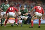 19 March 2005; Brian O'Driscoll, Ireland, in action against Shane Williams (11) and Tom Shanklin, Wales. RBS Six Nations Championship 2005, Wales v Ireland, Millennium Stadium, Cardiff, Wales. Picture credit; Brendan Moran / SPORTSFILE