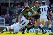 2 April 2005; Matt Mostyn, Connacht, is tackled by Chris Rhys Jones, 13 and Mark Cueto, Sale Sharks. European Challenge Cup 2004-2005, Semi-Final, Connacht v Sale Sharks, Sportsground, Galway. Picture credit; Pat Murphy / SPORTSFILE