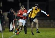 4 January 2014; Paddy Keenan, Louth, in action against Eoin O'Connor, DCU. Bord na Mona O'Byrne Cup, Group D, Round 1, Louth v DCU, Páirc Séamus Mhic hEochaidh, Haggardstown, Co Louth. Photo by Sportsfile