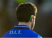 5 January 2014; Bernard Allen, DIT, places his gum shield around his ear at the end of the game against Meath. Bord na Mona O'Byrne Cup, Group C, Round 1, Meath v DIT, Páirc Táilteann, Navan, Co. Meath. Picture credit: David Maher / SPORTSFILE