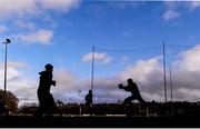 5 January 2014; Leitrim players warm up before the match. FBD League, Section B, Round 1, Leitrim v Galway IT, Cloone, Co. Leitrim. Picture credit: Ramsey Cardy / SPORTSFILE