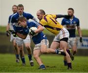 5 January 2014; Stephen Attride, Laois, in action against James Holmes, Wexford. Bord na Mona O'Byrne Cup, Group A, Round 1, Wexford v Laois, Geraldine O’Hanrahans GAA Club, O'Kennedy Park, New Ross, Co. Wexford. Picture credit: Ray McManus / SPORTSFILE
