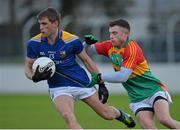 5 January 2014; Paul McKeon, Longford, in action against Kieran Nolan, Carlow. Bord na Mona O'Byrne Cup, Group B, Round 1, Carlow v Longford, Dr. Cullen Park, Carlow. Picture credit: Matt Browne / SPORTSFILE