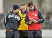 5 January 2014; Carlow manager Anthony Rainbow, right, with selector Damien McMahon and trainer Wayne Middleton in conversation at half-time after their team had not scored in the first half. Bord na Mona O'Byrne Cup, Group B, Round 1, Carlow v Longford, Dr. Cullen Park, Carlow. Picture credit: Matt Browne / SPORTSFILE