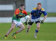 5 January 2014; Hugh Gahan, Carlow, in action against Gerard Smith, Longford. Bord na Mona O'Byrne Cup, Group B, Round 1, Carlow v Longford, Dr. Cullen Park, Carlow. Picture credit: Matt Browne / SPORTSFILE