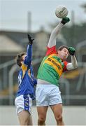 5 January 2014; Daniel St.Ledger, Carlow, in action against Colm Smyth, Longford. Bord na Mona O'Byrne Cup, Group B, Round 1, Carlow v Longford, Dr. Cullen Park, Carlow. Picture credit: Matt Browne / SPORTSFILE