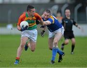 5 January 2014; Graham Power, Carlow, in action against Brian Farrell, Longford. Bord na Mona O'Byrne Cup, Group B, Round 1, Carlow v Longford, Dr. Cullen Park, Carlow. Picture credit: Matt Browne / SPORTSFILE