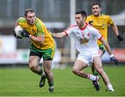 5 January 2014; Dermot Molloy, Donegal, in action against Emmet McKenna, Tyrone. Power NI Dr. McKenna Cup, Section A, Round 1, Donegal v Tyrone, O'Donnell Park, Letterkenny, Co. Donegal. Picture credit: Stephen McCarthy / SPORTSFILE