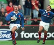 24 October 1999; Philippe Bernat-Salles, France, celebrates his 2nd try against Argentina with team-mate Raphael Ibanez, no.2. 1999 Rugby World Cup, France v Argentina, Lansdowne Road, Dublin. Picture credit: Brendan Moran / SPORTSFILE