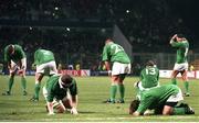 20 October 1999; Dejected Irish players fall to the ground immediately at the final whistle after defeat by Argentina. 1999 Rugby World Cup, Ireland v Argentina, Stade Felix Bollaert, Lens, France. Picture credit: Matt Browne / SPORTSFILE