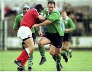 10 September 1999; Ross Nesdale, Ireland, is tackled by Kevin O'Riordan, Munster. Pre-Season Friendly, Munster v Ireland, Musgrave Park, Cork. Picture credit: Ray Lohan / SPORTSFILE