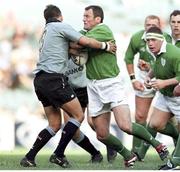5 June 1999; Eric Elwood, Ireland, is tackled by Sam Payne, NSW. 1999 Australia Tour, New South Wales v Ireland, Sydney Football Stadium, New South Wales, Australia. Picture credit: Matt Browne / SPORTSFILE