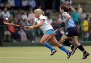 3 April 2005; Catriona Carey, Hermes, in action against Bridget McKeever, Ballymoney. Womens Irish Senior Cup Final, Ballymoney v Hermes, Belfield, UCD, Dublin. Picture credit; Brian Lawless / SPORTSFILE