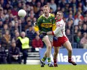3 April 2005; Liam Hassett, Kerry, in action against Philip Jordan, Tyrone. Allianz National Football League, Division 1A, Kerry v Tyrone, Fitzgerald Stadium, Killarney, Co. Kerry. Picture credit; Brendan Moran / SPORTSFILE