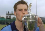 3 April 2005; Lisnagarvey's Philip Stirling kisses the cup after victory in the final. Mens Irish Senior Cup Final, Instonians v Lisnagarvey, Belfield, UCD, Dublin. Picture credit; Brian Lawless / SPORTSFILE