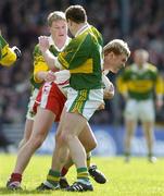 3 April 2005; Owen Mulligan, Tyrone, in action against Seamus Moynihan, right and Mike Frank Russell, Kerry. Allianz National Football League, Division 1A, Kerry v Tyrone, Fitzgerald Stadium, Killarney, Co. Kerry. Picture credit; Brendan Moran / SPORTSFILE