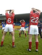 27 March 2005; Cork players Sean Og O'hAilpin, Ronan Curran, (6) and Ben O'Connor (22) warm down as manager John Allen takes notes. Allianz National Hurling League, Division 1B, Tipperary v Cork, Semple Stadium, Thurles, Co. Tipperary. Picture credit; Damien Eagers / SPORTSFILE