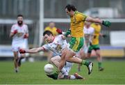 5 January 2014; Michael Murphy, Donegal, in action against Conor Clare, Tyrone. Power NI Dr. McKenna Cup, Section A, Round 1, Donegal v Tyrone, O'Donnell Park, Letterkenny, Co. Donegal. Picture credit: Stephen McCarthy / SPORTSFILE