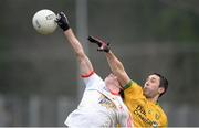 5 January 2014; Conan Grugan, Tyrone, in action against Rory Kavanagh, Donegal. Power NI Dr. McKenna Cup, Section A, Round 1, Donegal v Tyrone, O'Donnell Park, Letterkenny, Co. Donegal. Picture credit: Stephen McCarthy / SPORTSFILE