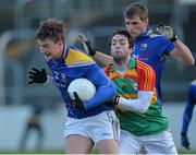 5 January 2014; John Keegan, Longford, in action against Brendan Kavanagh, Carlow. Bord na Mona O'Byrne Cup, Group B, Round 1, Carlow v Longford, Dr. Cullen Park, Carlow. Picture credit: Matt Browne / SPORTSFILE